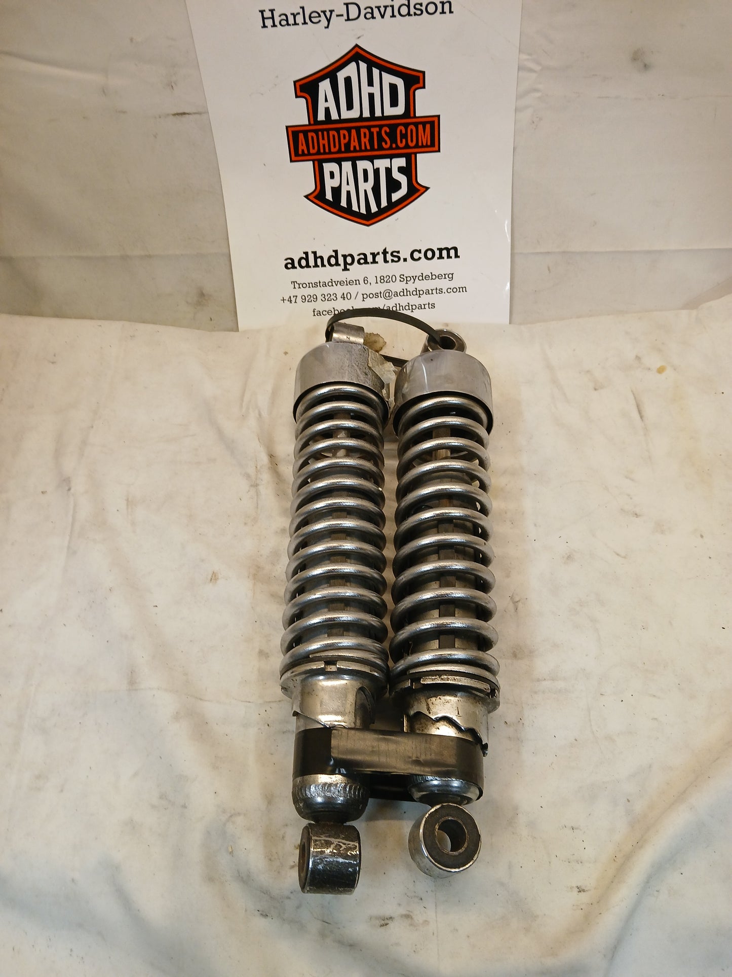 Justerbare dempere bak Sportster